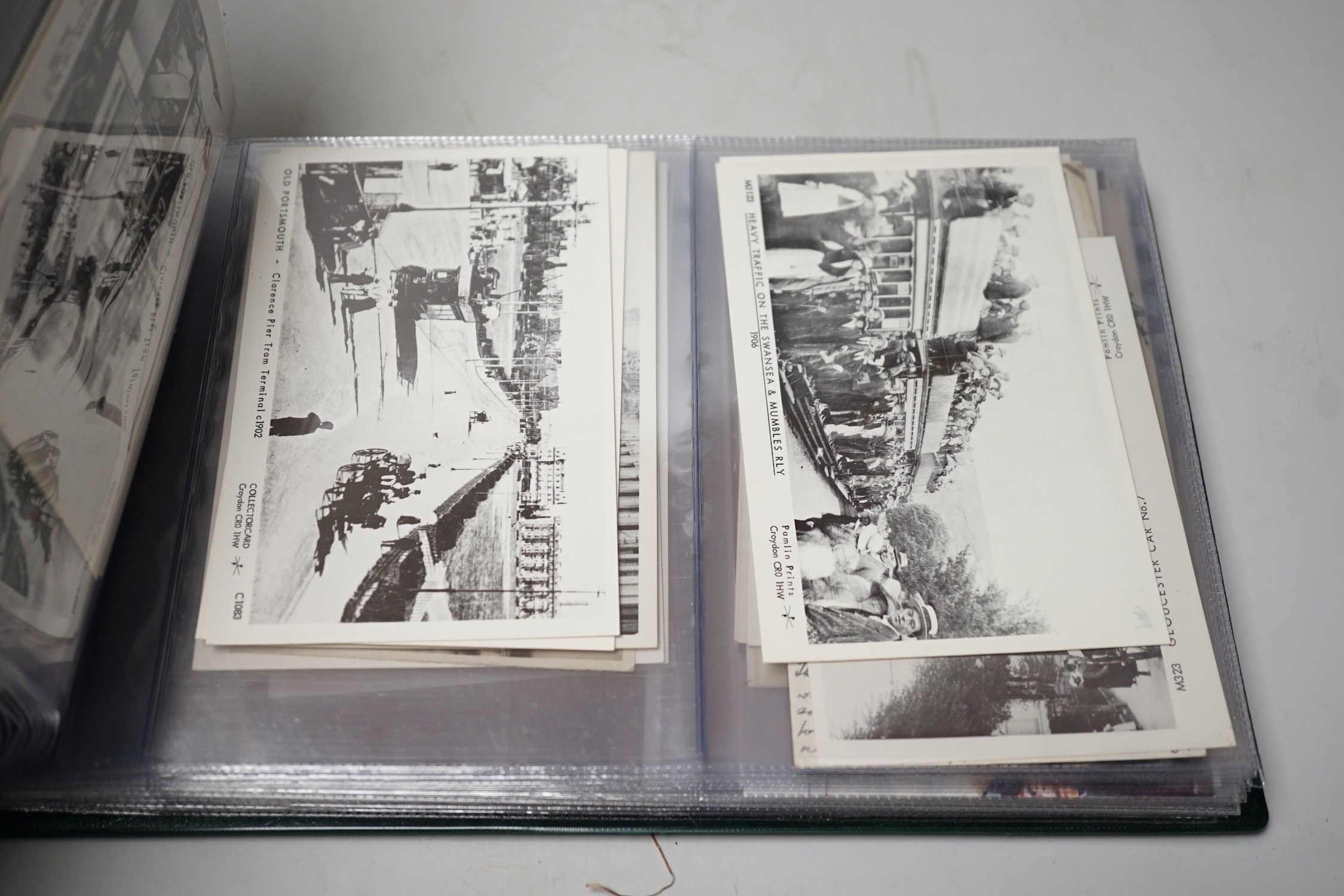 Postcards in three albums, to include themes, transport, theatre and topographical